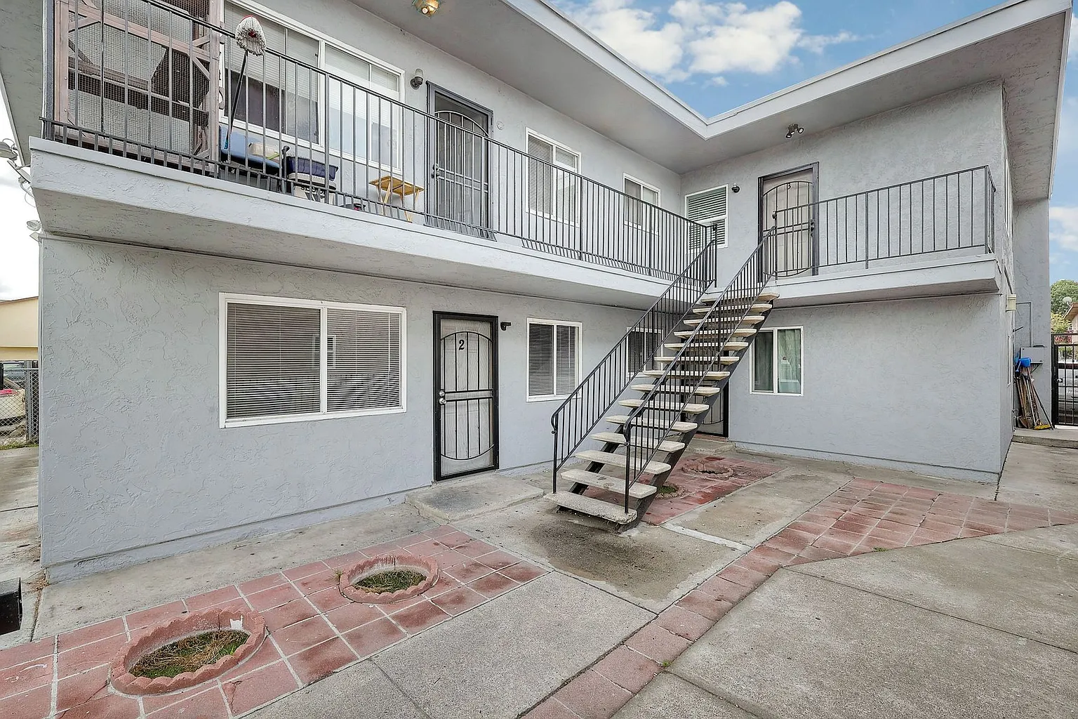 Freshly Painted Upstairs Unit with New Luxury Vinyl Floors & Parking