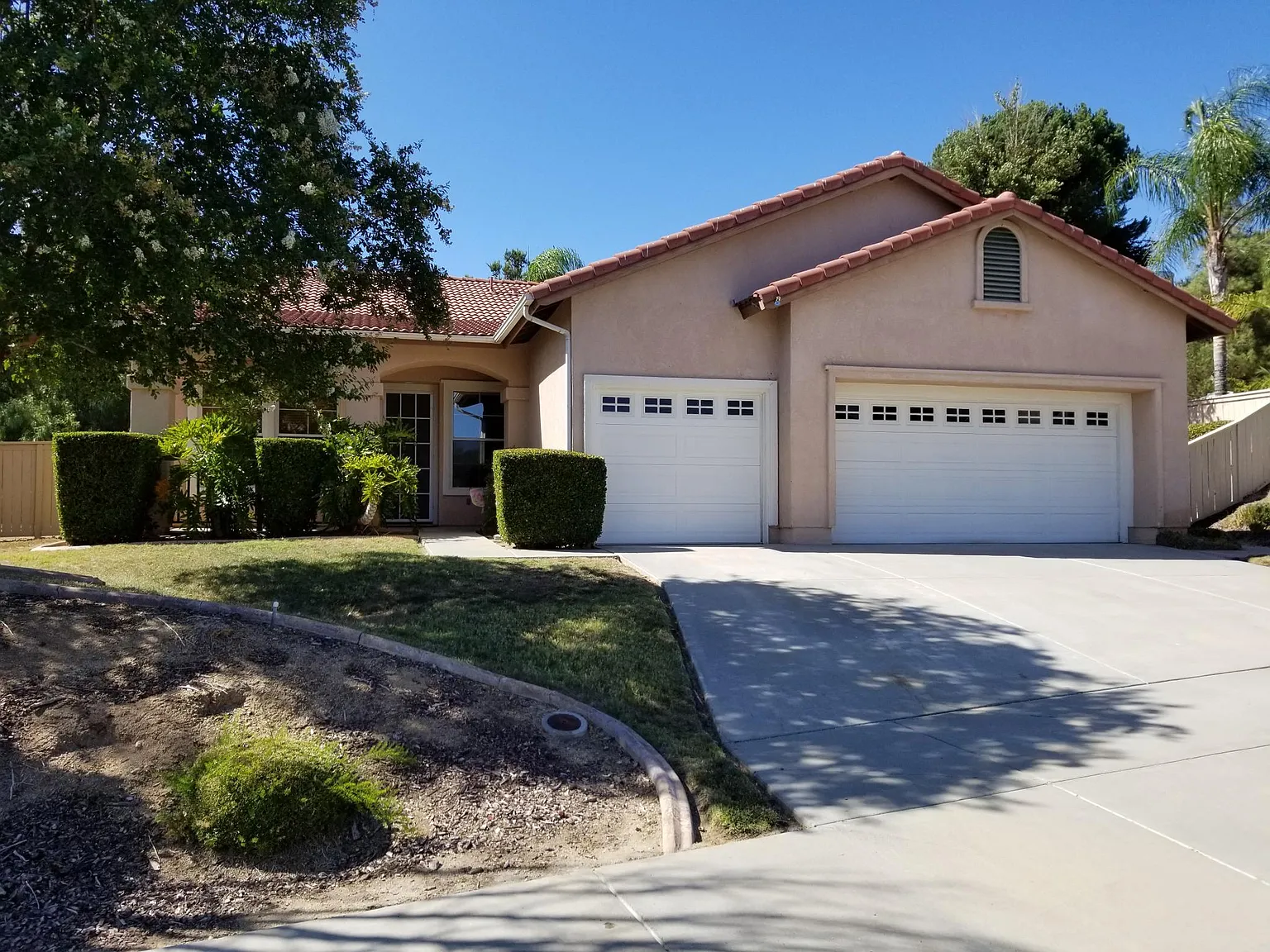 Beautifully Upgraded Corner Unit with 2-Car Garage & Views