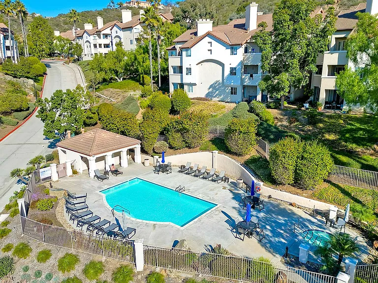 Beautifully Upgraded Corner Unit with 2-Car Garage & Views