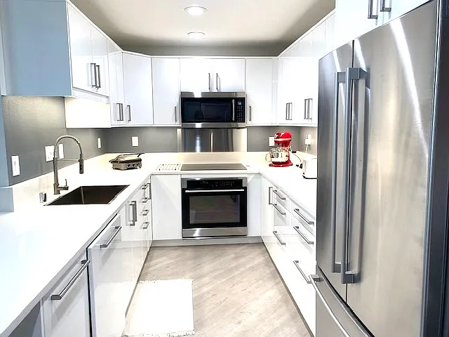 Fully Furnished, Designer-Remodeled Condo with Quiet Top-Floor Living